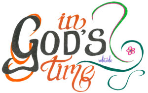 The words "In God's Time" written in black and orange with green swirls on the right side