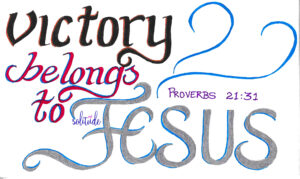 the words "victory belongs to Jesus" written in black, pink and silver